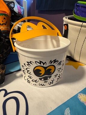 McDonald's White Halloween Treat Pail with Yellow Handle and Black Graphic